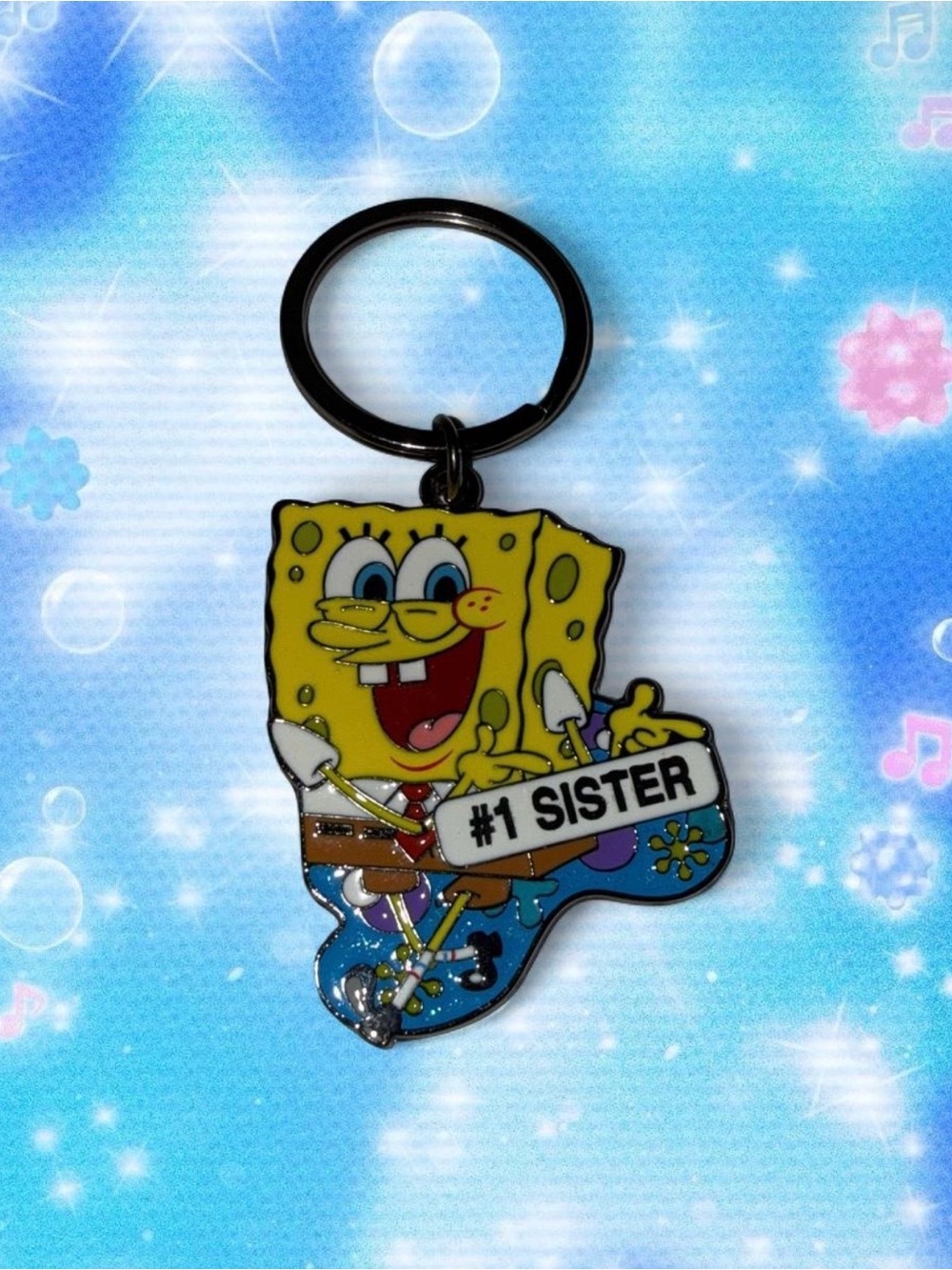SpongeBob SquarePants metal keychain with #1 SISTER text